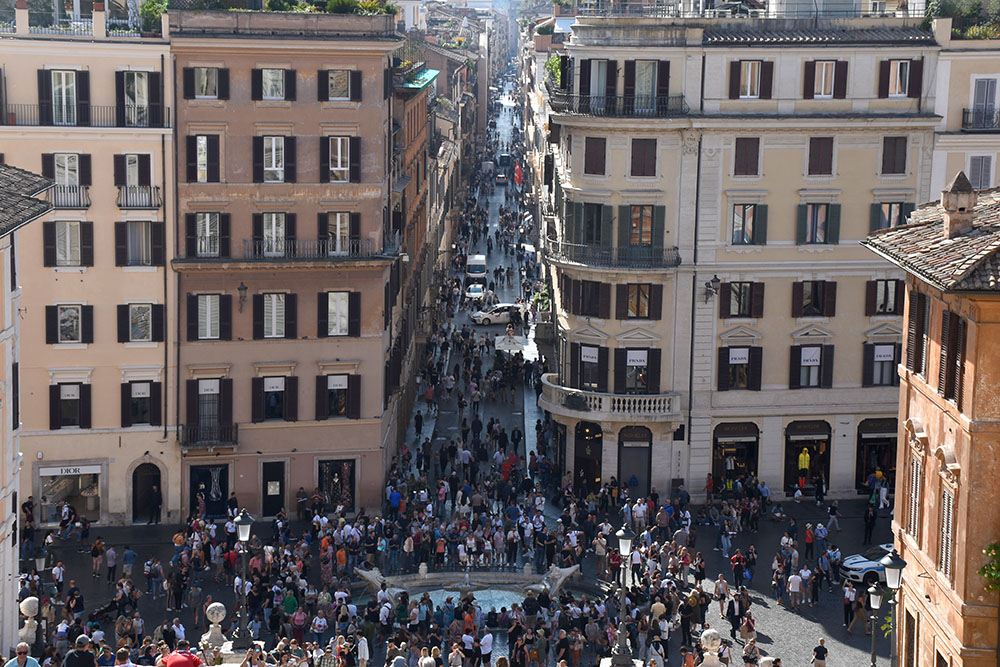 From the summit of the Spanish Steps, behold the bustling crowd below