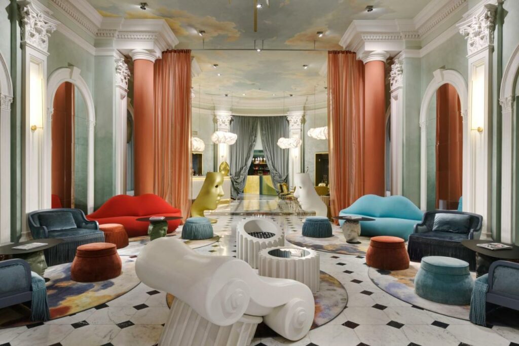 Vibrant furniture in a hotel lobby, enhancing the ambiance with a pop of color and modern design.