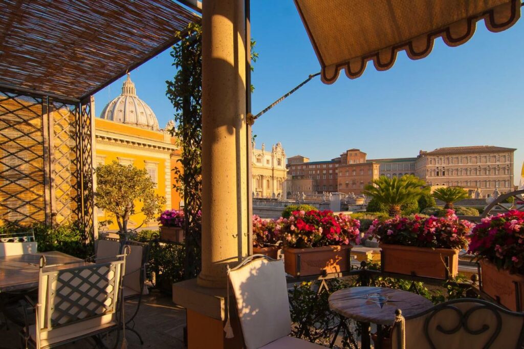 Stunning views of Saint Peter's Square from hotel's rooftop terrace.